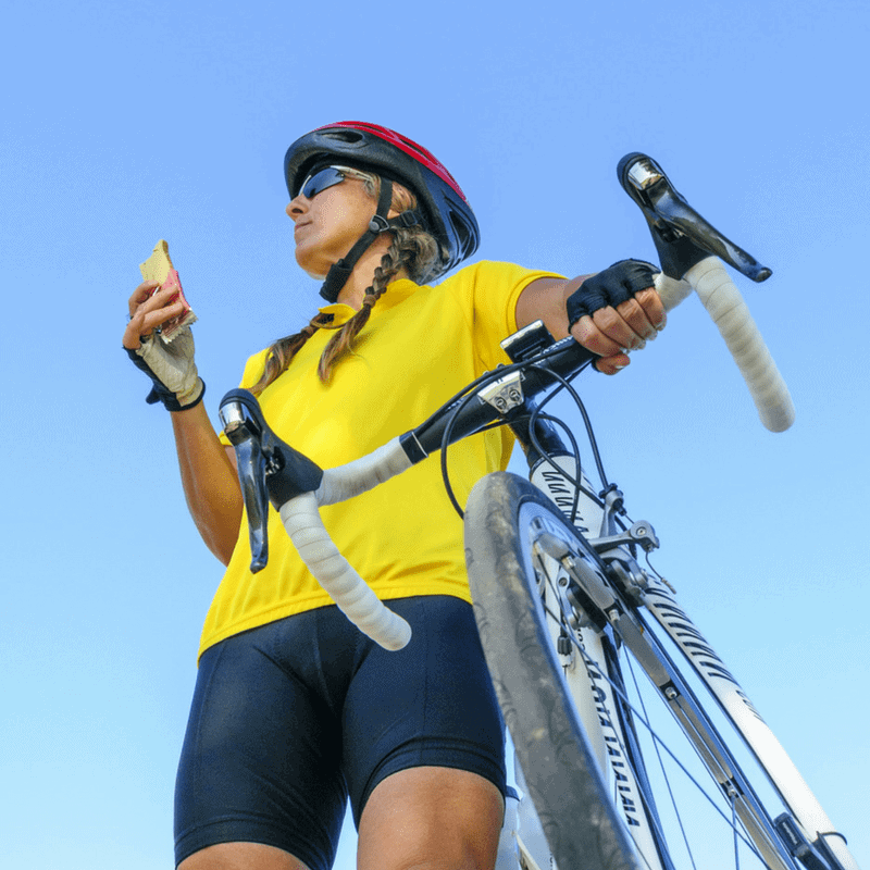 lady eating while resting from cycling
